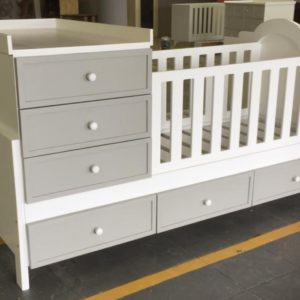 ROOM-IN-A-BOX - base is a single bed with cot and compactum on top.